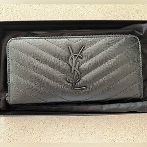 CASSANDRE MATELASSÉ ZIP AROUND WALLET IN GRAIN DE POUDRE LEATHER BLACK